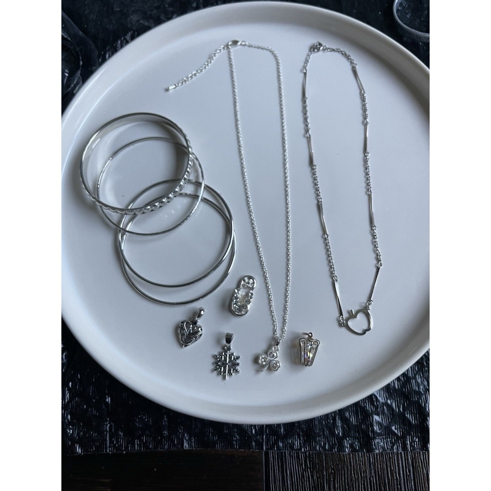 Jewelry Bundle Includes 2 Necklaces, 4 Extra Charms , 1 Set Of 4 Bangles.